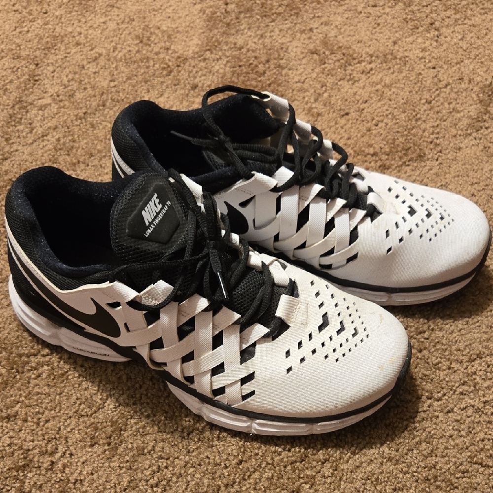 Nike White and Black Athletic Shoes with Modern Design